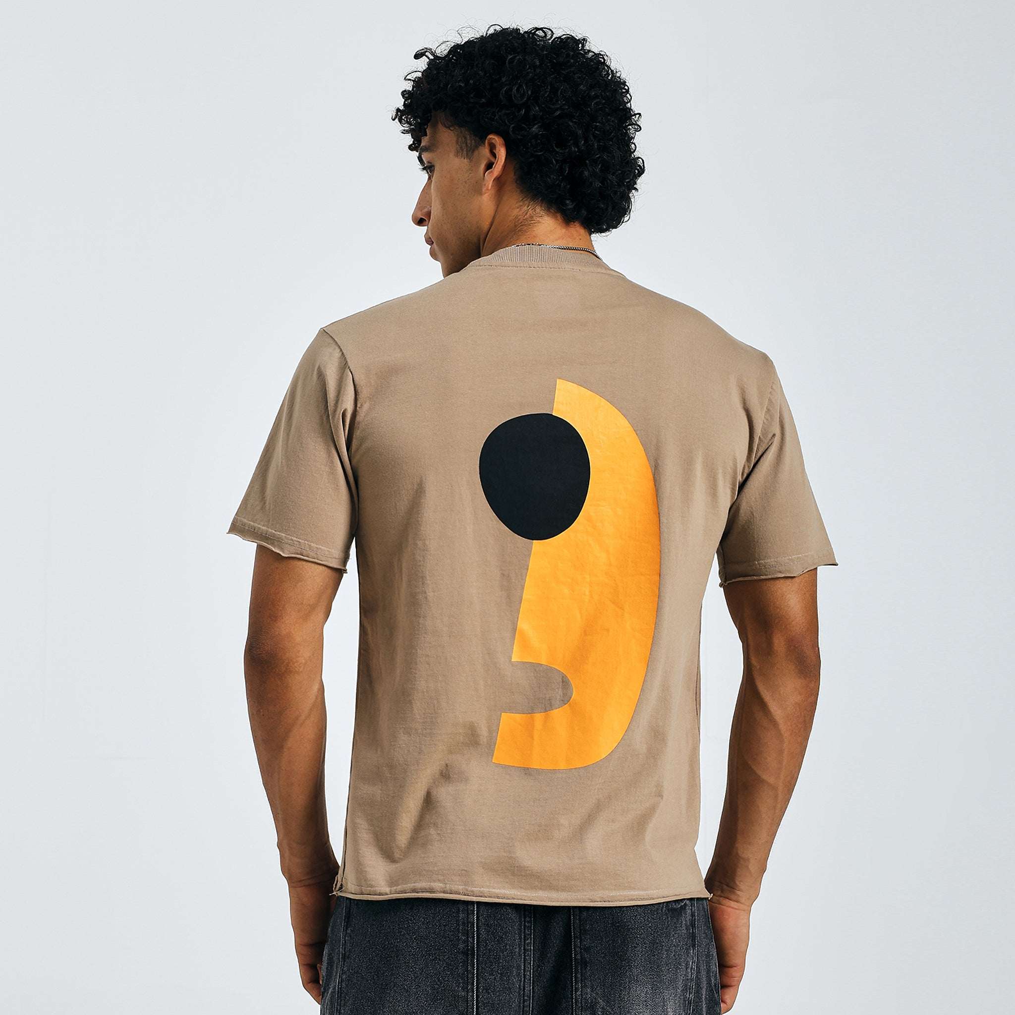 Beige overszed printed t-shirt with abstract art