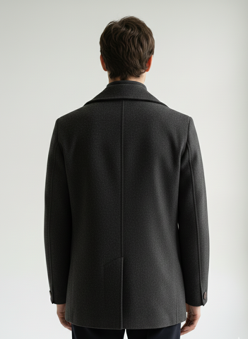 Man wearing a gray coat from behind on a white background