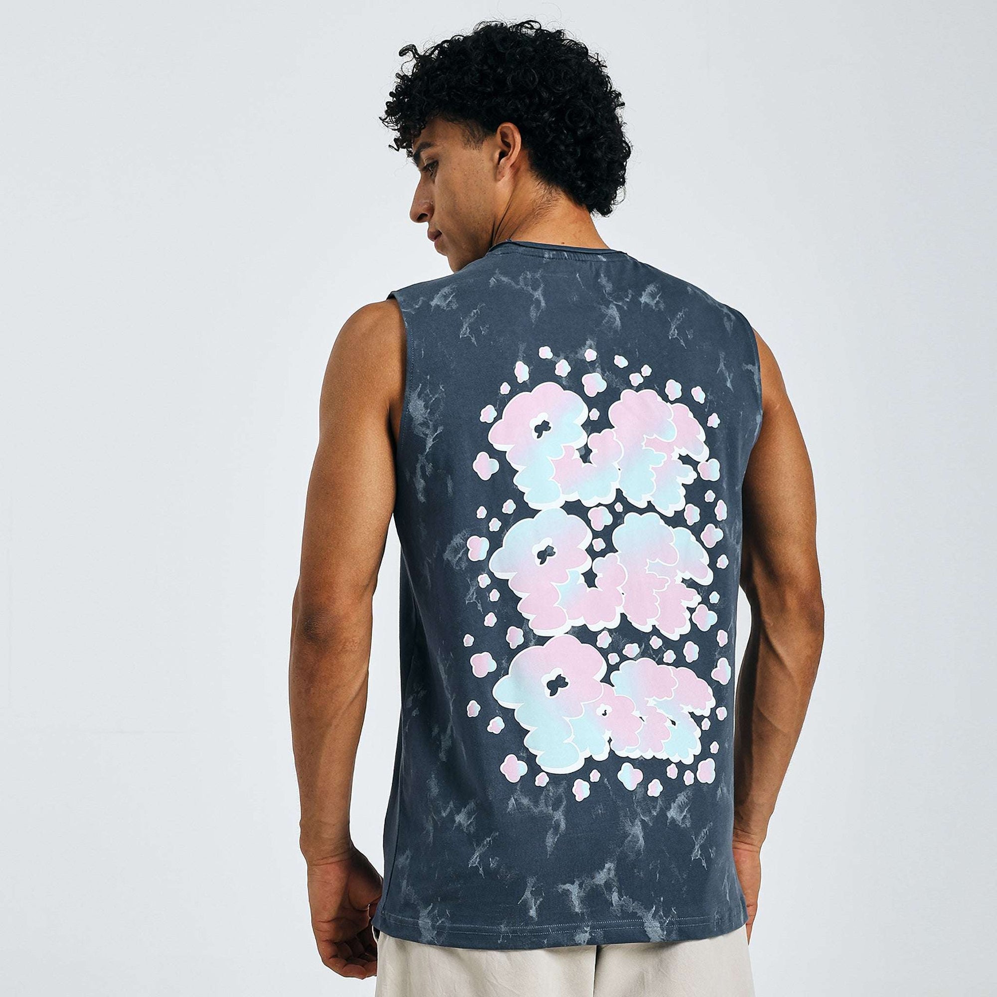 Dark blue tie-dye Yin-Yang tank with meditating figure print, "LET THAT SHIT GO" text, and raw edges on 240 GSM cotton sinker fabric.