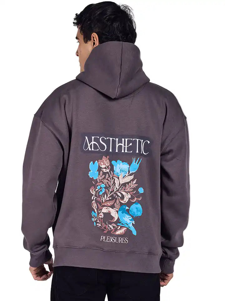 Dark grey aesthetic hoodie with floral art and oversized fit.