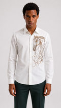 Man wearing a white shirt with a horse design on a plain background