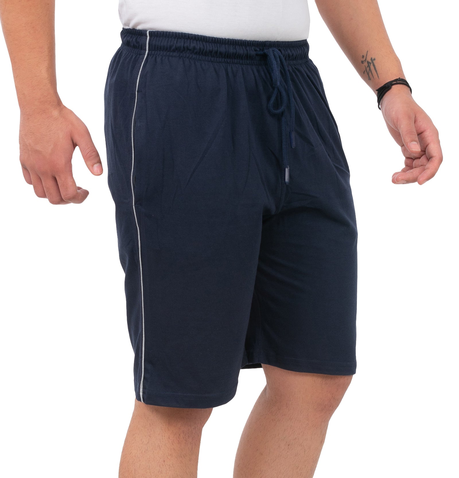 Navy blue shorts worn by a person on a white background