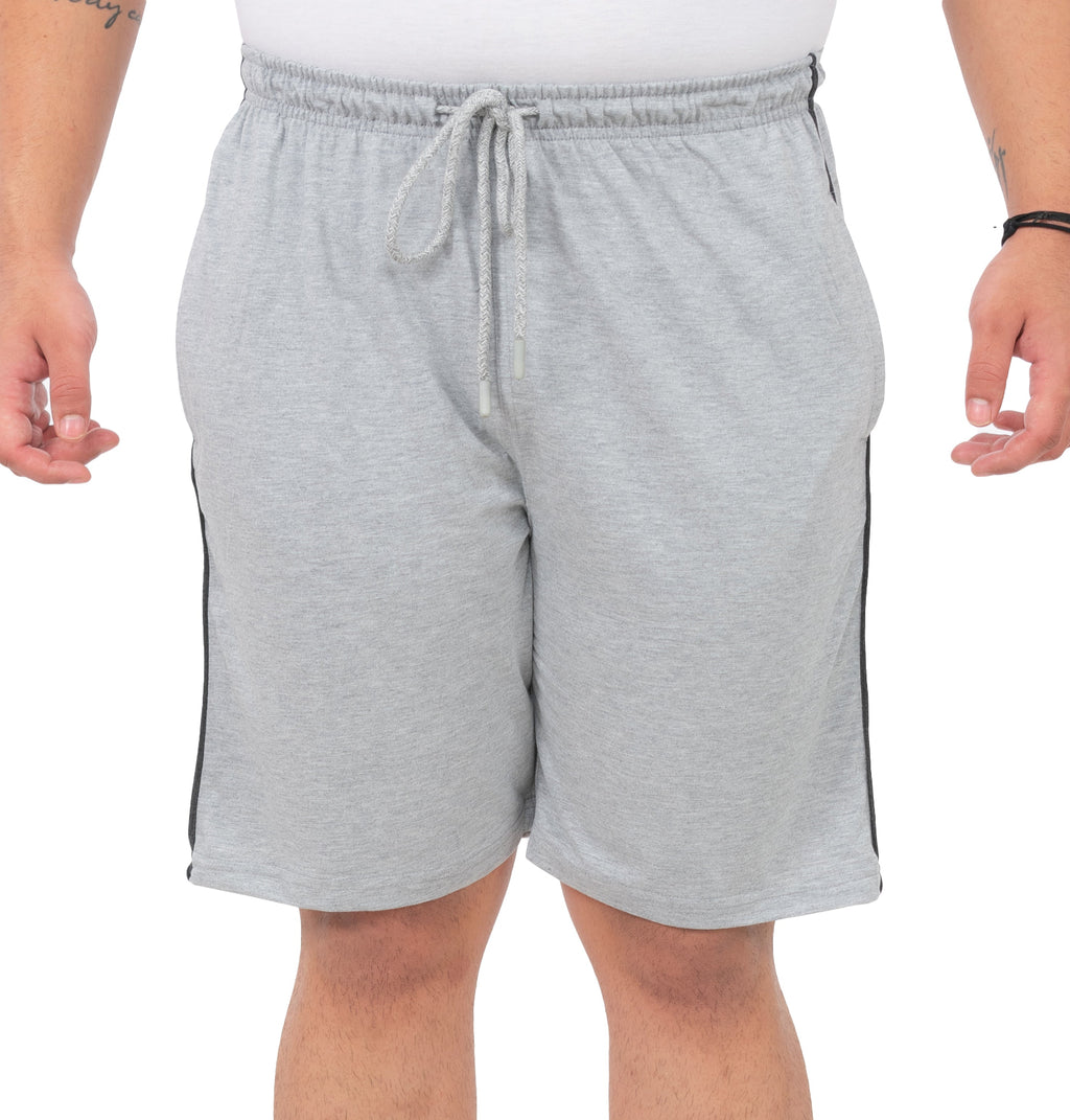 Gray shorts worn by a person on a white background