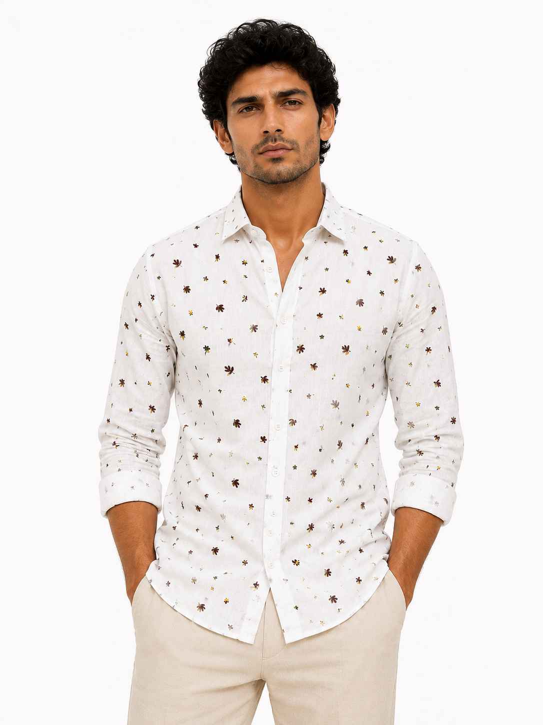 Man wearing a white patterned shirt on a white background