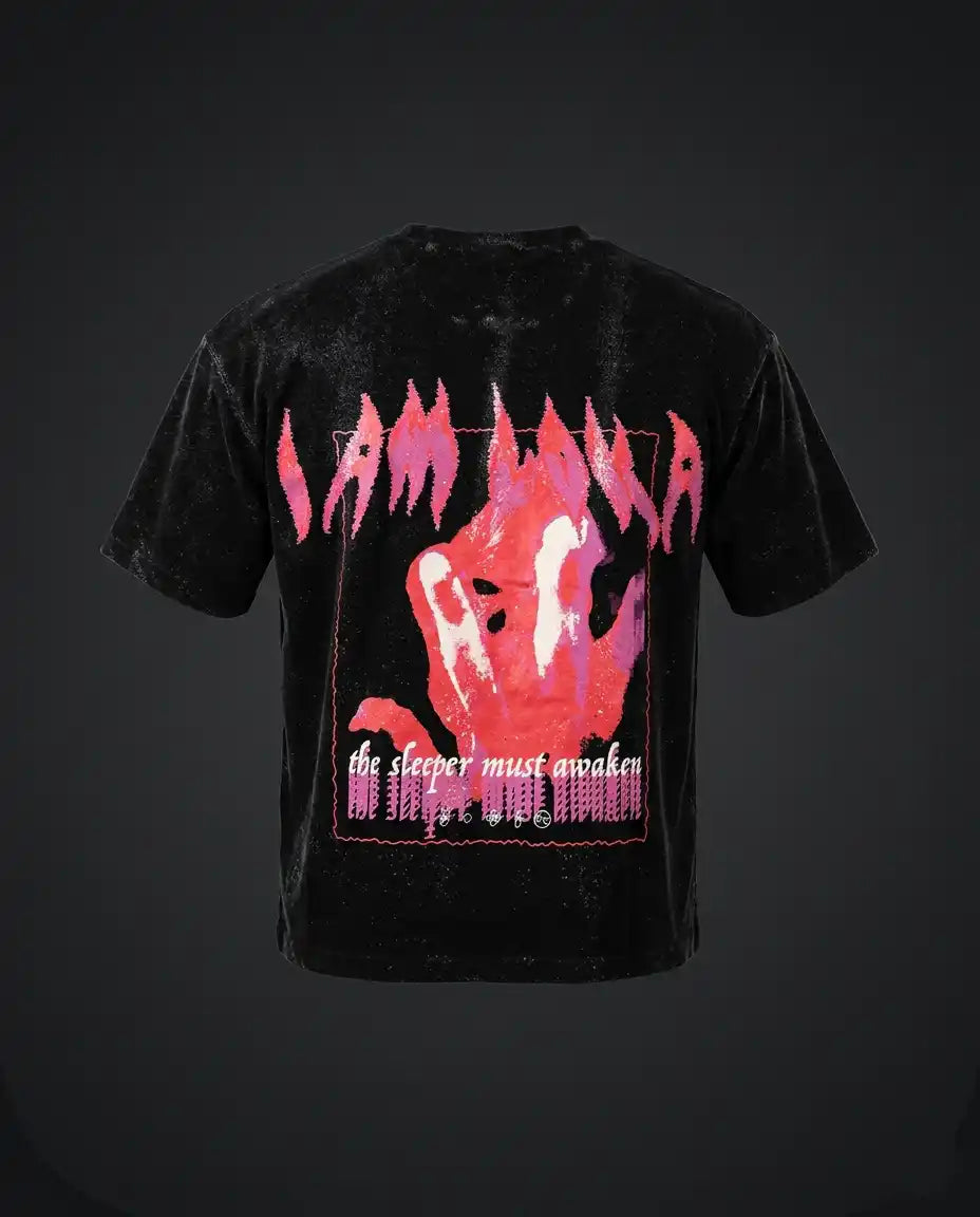 Black t-shirt with pink graphic design on a dark background