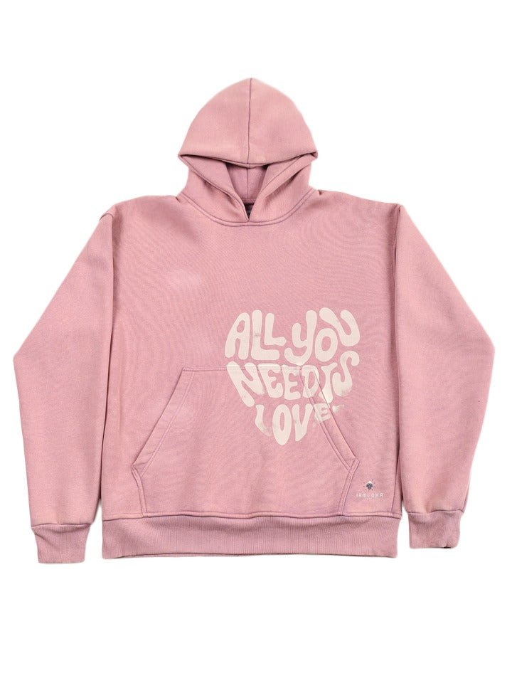 Onion pink hoodie with "All You Need is Love" text, oversized fit, pure cotton, and minimal fade effect.