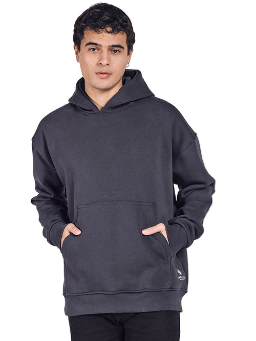 charcoal oversized hoodie with colorful abstract design on the back against a white background