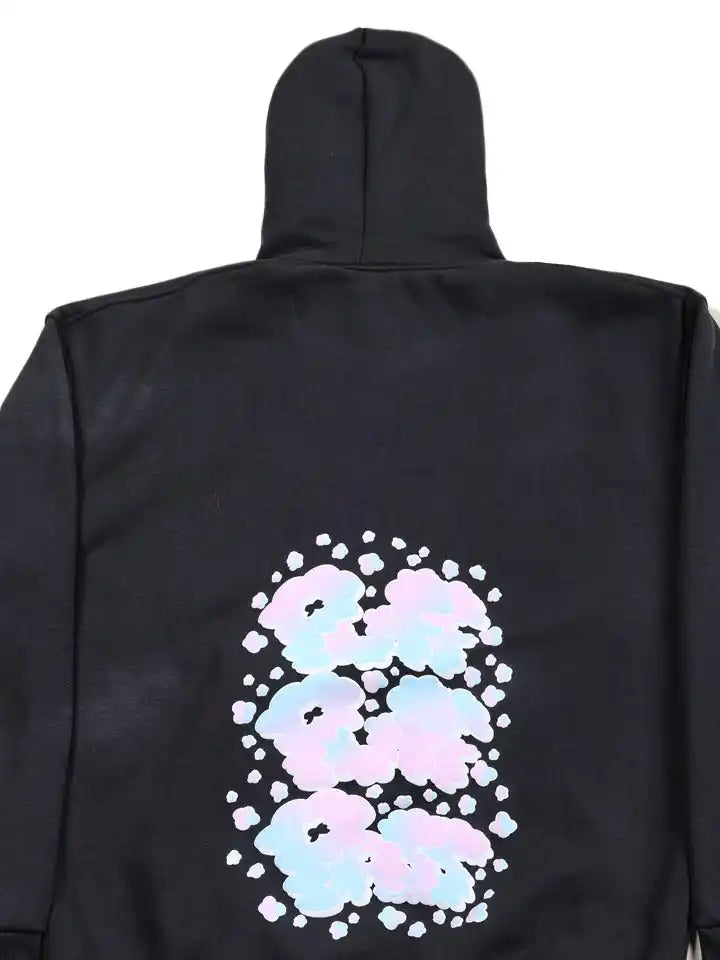 charcoal oversized hoodie with colorful abstract design on the back against a white background