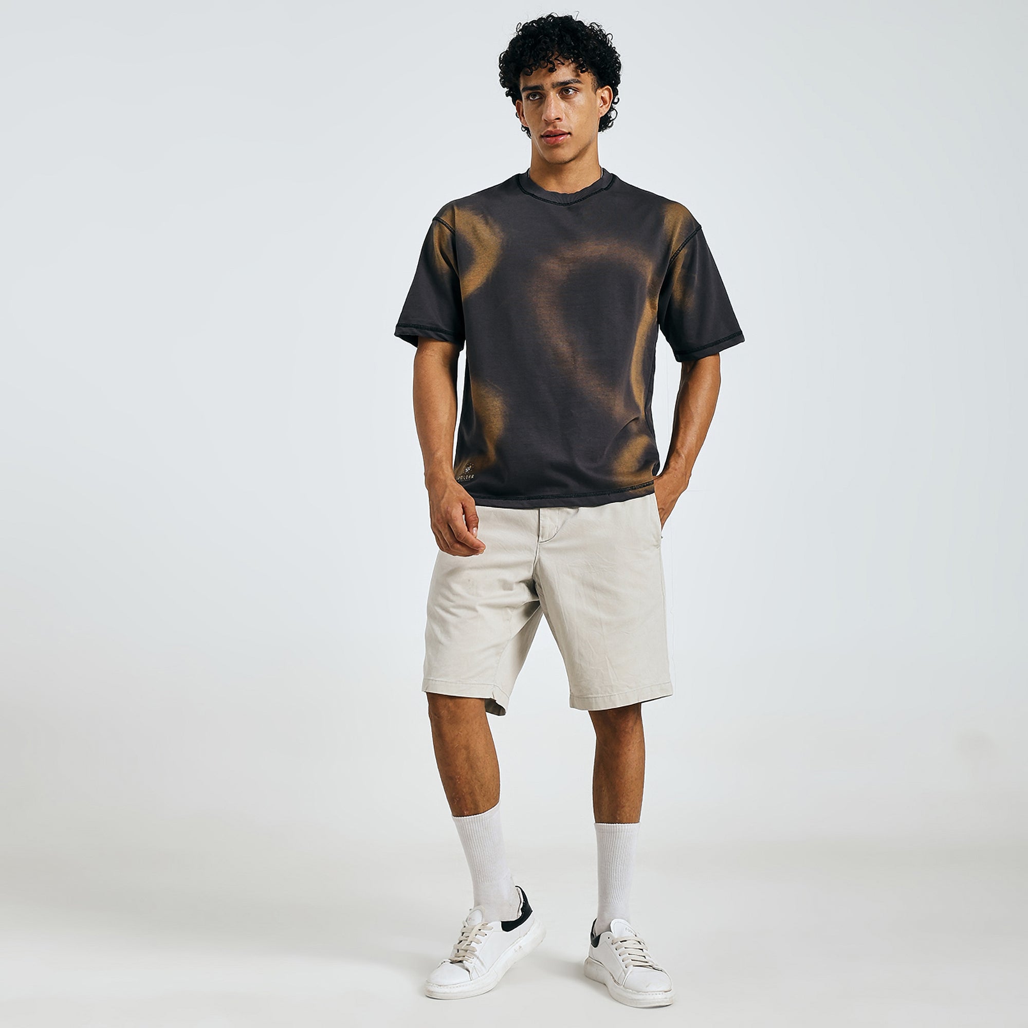 Shop black tie-dye mandala tee, front view, with beige shorts