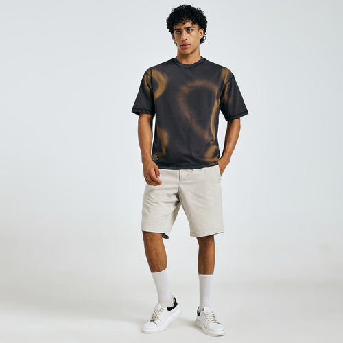 Shop black tie-dye mandala tee, front view, with beige shorts