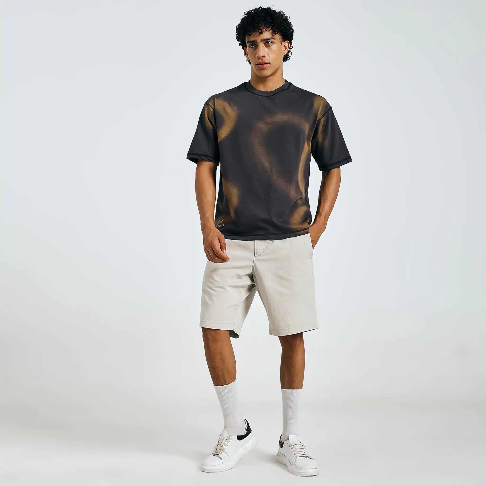 Shop black tie-dye mandala tee, front view, with beige shorts