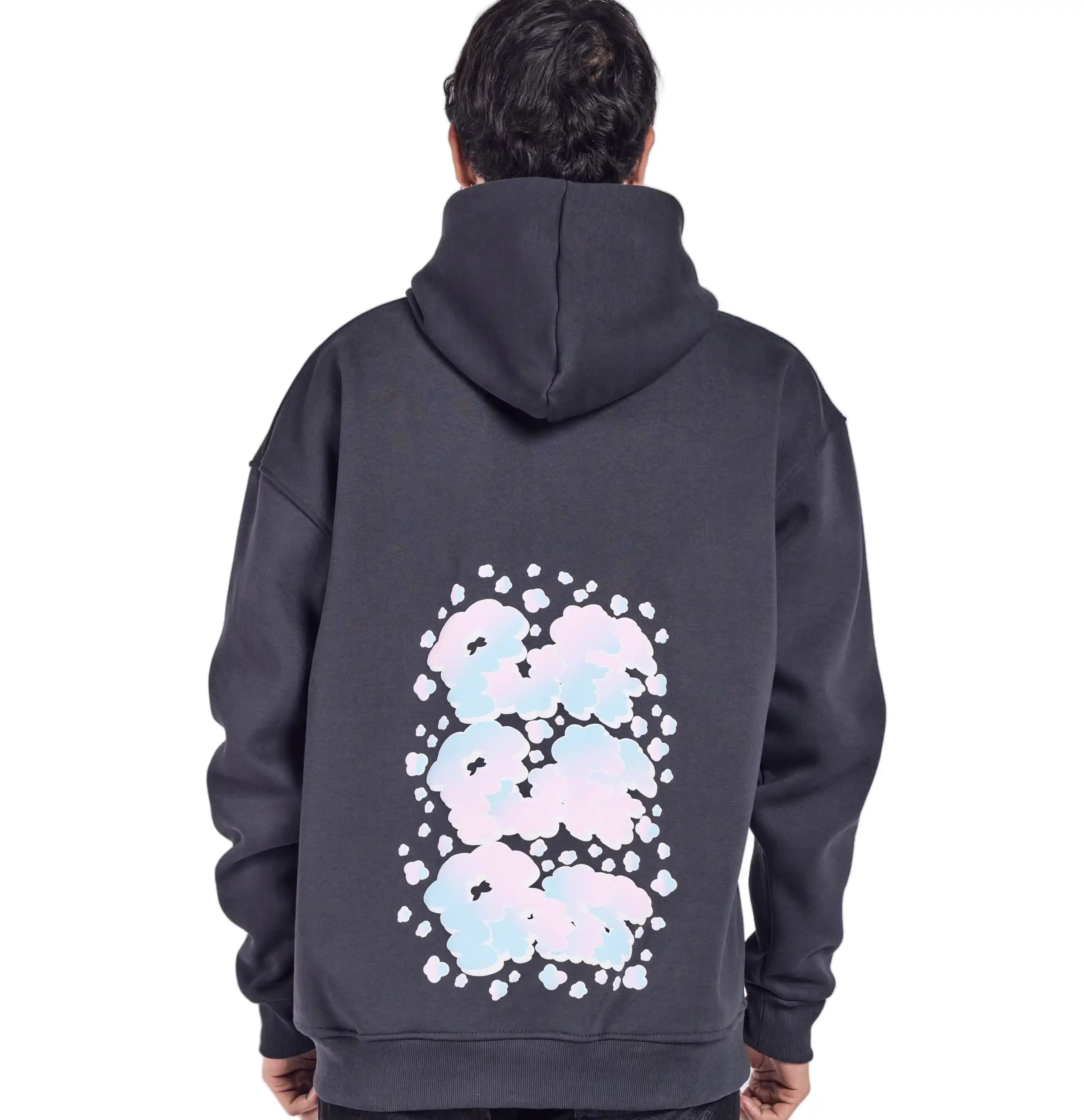 A person wearing a charcoal gray hoodie with a floral pattern on the back, facing away from the camera.